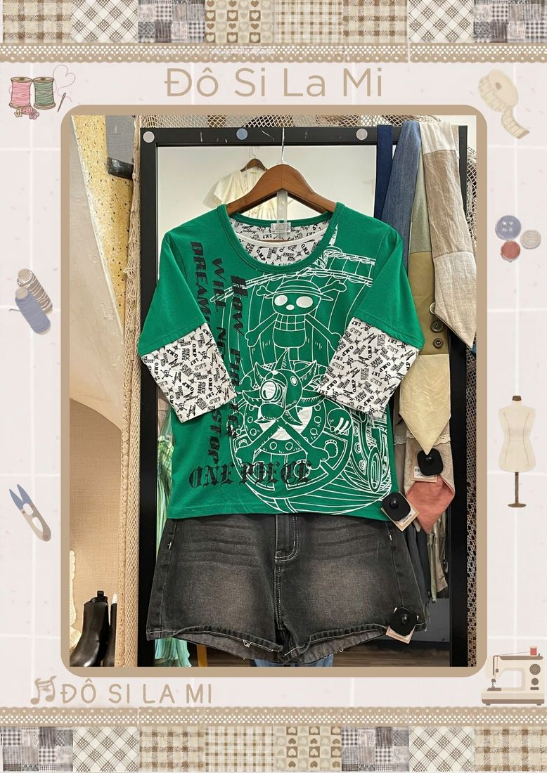 Áo thun in hình xanh lá phối quần short jean xám